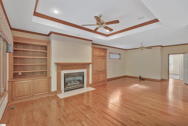 124 Bradley Park, Anderson, SC 29621 - unfurnished living room featuring a ceiling fan, a raised ceiling, light wood-style floors, crown molding, and recessed lighting