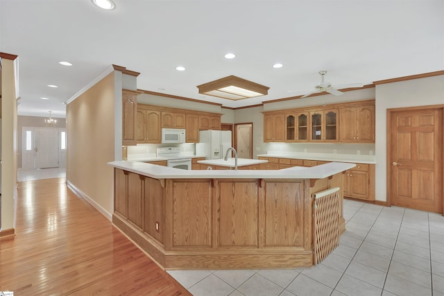 124 Bradley Park, Anderson, SC 29621 - kitchen with white appliances, light countertops, a kitchen bar, crown molding, and recessed lighting