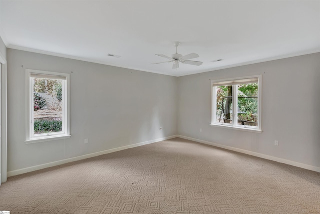 124 Bradley Park, Anderson, SC 29621 - empty room featuring healthy amount of natural light, a ceiling fan, light colored carpet, baseboards, and crown molding