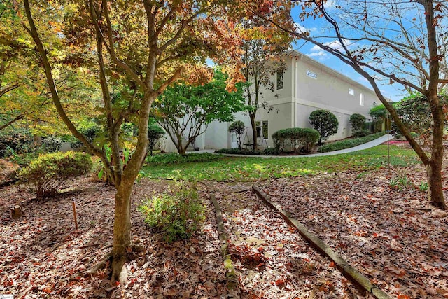 124 Bradley Park, Anderson, SC 29621 - view of home's exterior with stucco siding and a yard
