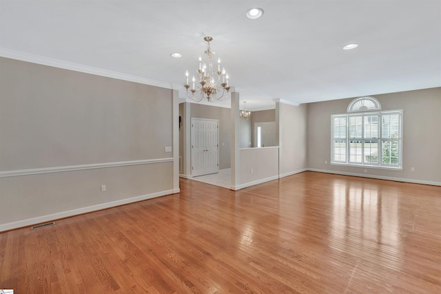 124 Bradley Park, Anderson, SC 29621 - unfurnished room with a chandelier, baseboards, recessed lighting, light wood-style flooring, and crown molding