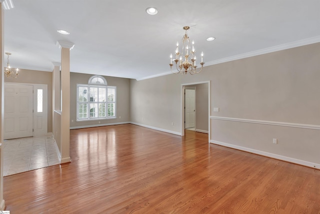 124 Bradley Park, Anderson, SC 29621 - unfurnished living room with a chandelier, ornamental molding, baseboards, light wood-style floors, and recessed lighting