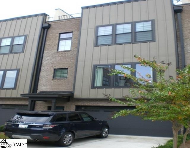 121 W Stone Ave Unit 15, Greenville, SC 29609 - view of property with driveway and an attached garage