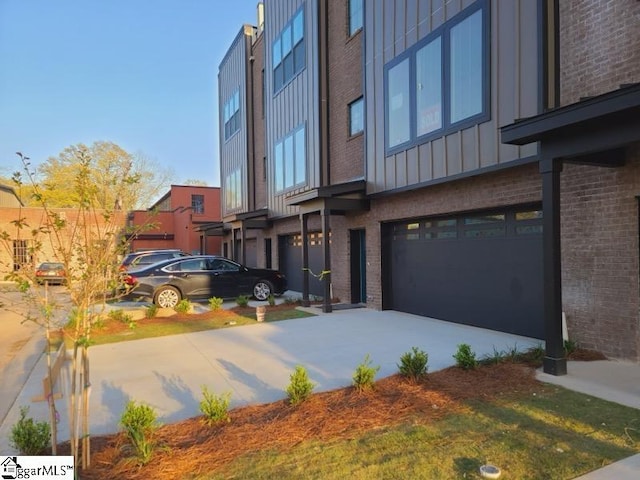 exterior space with a garage