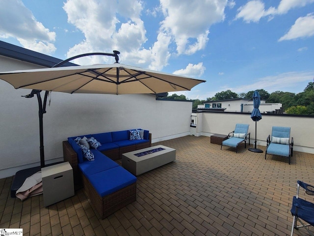121 W Stone Ave Unit 15, Greenville, SC 29609 - view of patio with an outdoor living space with a fire pit