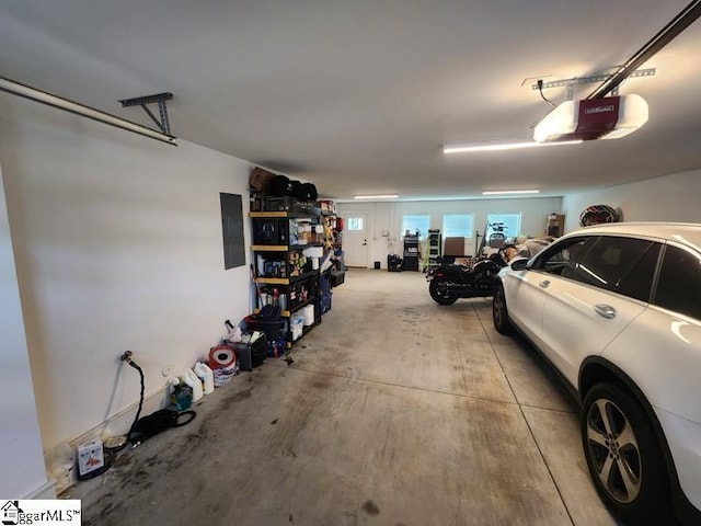 garage featuring a garage door opener