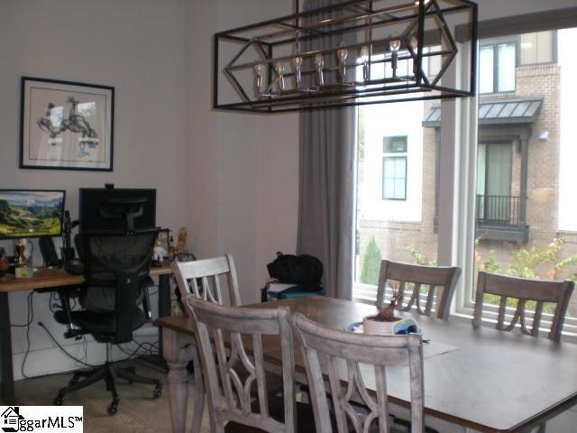 dining space with a chandelier