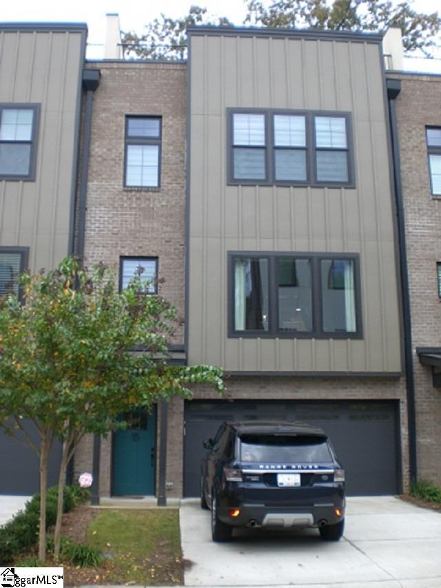 121 W Stone Ave Unit 15, Greenville, SC 29609 - view of property with a garage and concrete driveway