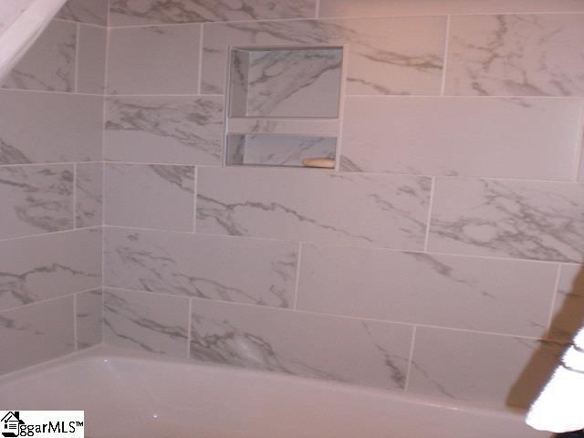 121 W Stone Ave Unit 15, Greenville, SC 29609 - bathroom featuring shower / bath combination