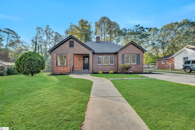 view of front of house with a front lawn