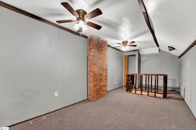 additional living space with light colored carpet, vaulted ceiling, and ornate columns