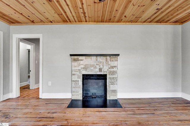 details with wood ceiling, a fireplace, wood-type flooring, and ornamental molding