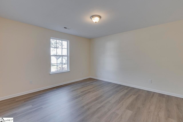 empty room featuring light hardwood / wood-style floors