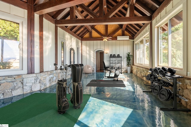 sunroom with vaulted ceiling with beams