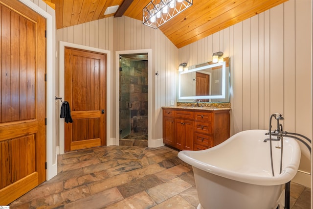 bathroom with vaulted ceiling with beams, wood ceiling, shower with separate bathtub, and vanity