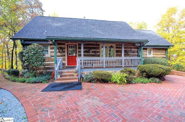 view of front of home featuring covered porch