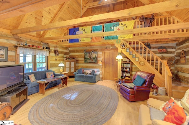 living room featuring beamed ceiling, wood-type flooring, high vaulted ceiling, and wooden ceiling