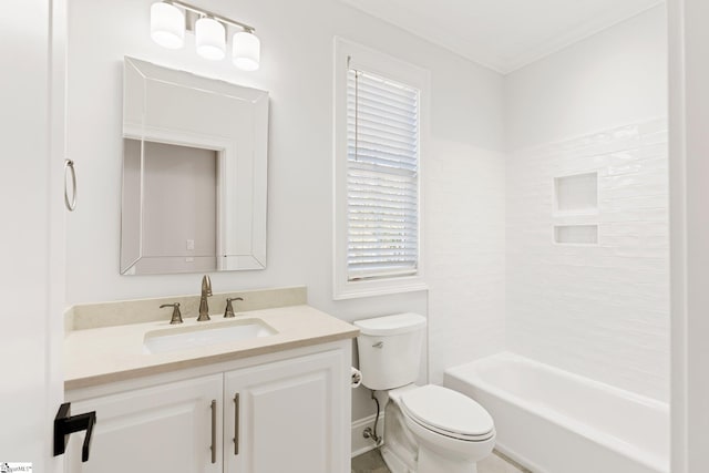 full bathroom featuring vanity, ornamental molding,  shower combination, and toilet