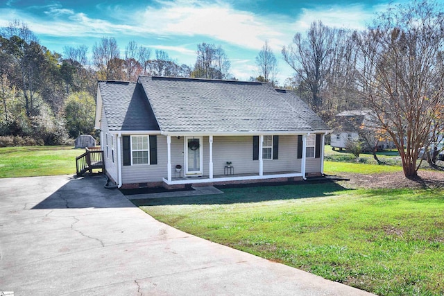 view of front of home with a porch and a front lawn