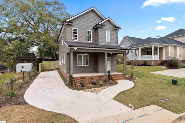 view of front facade featuring a porch and a front yard