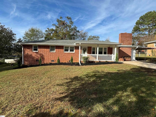 ranch-style home with a front yard, a porch, and a carport