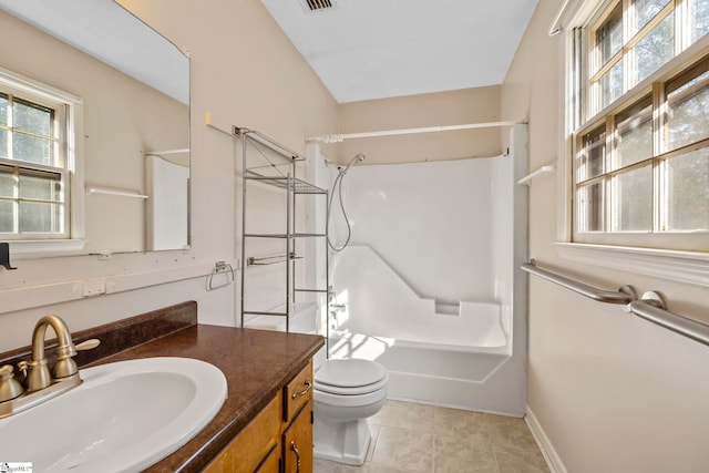 full bathroom with tile patterned flooring, shower / tub combination, vanity, and toilet