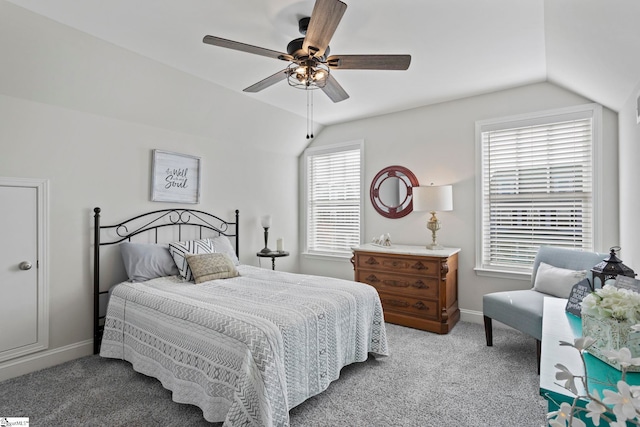 bedroom featuring ceiling fan, lofted ceiling, and light carpet