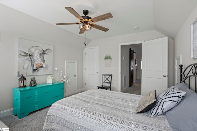 bedroom featuring carpet flooring, ceiling fan, and vaulted ceiling