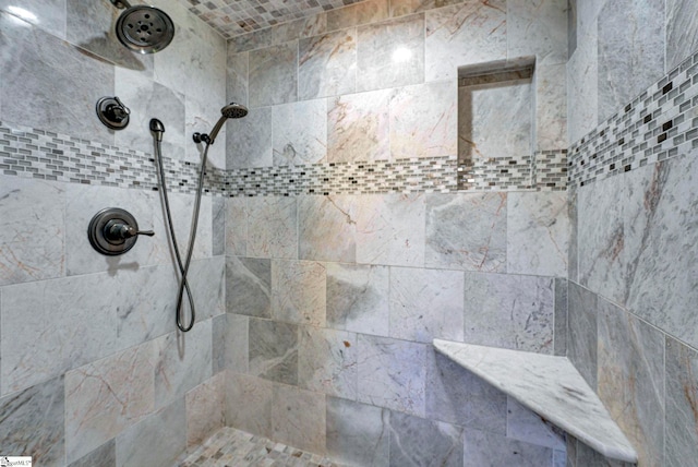 details featuring a tile shower