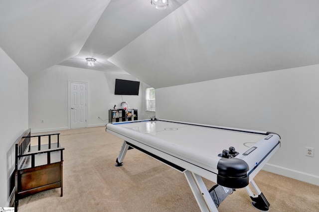 playroom with light colored carpet and vaulted ceiling