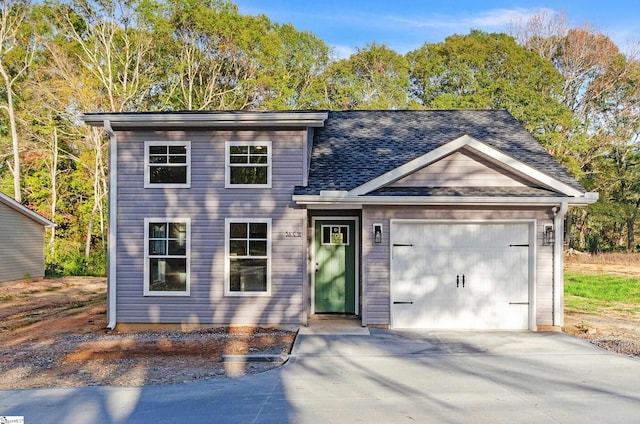 view of front of home featuring a garage