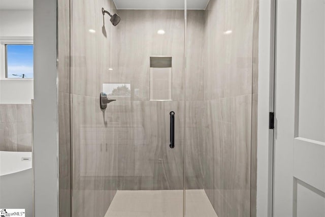 bathroom featuring walk in shower