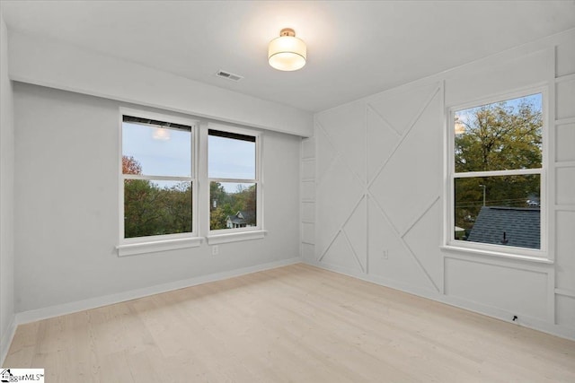 empty room with light wood-type flooring