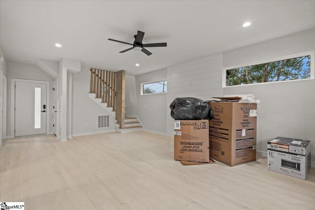 interior space featuring ceiling fan and light hardwood / wood-style flooring