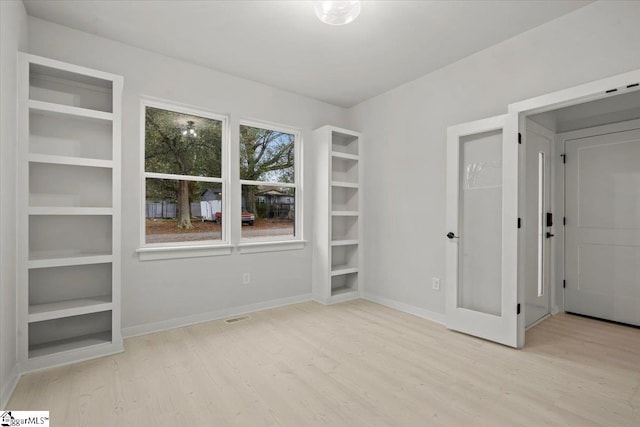 empty room featuring light hardwood / wood-style floors