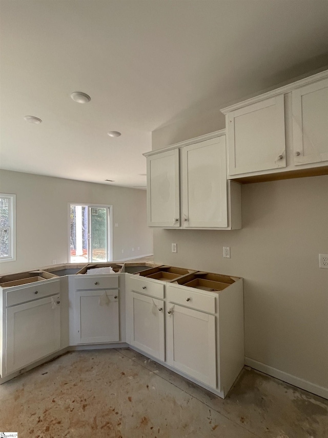 kitchen featuring white cabinetry