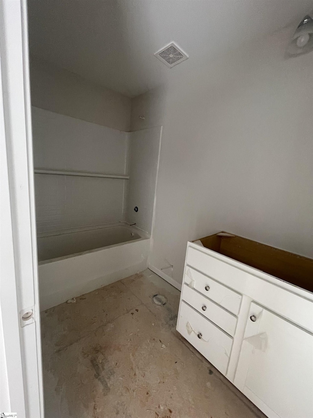 bathroom featuring concrete flooring