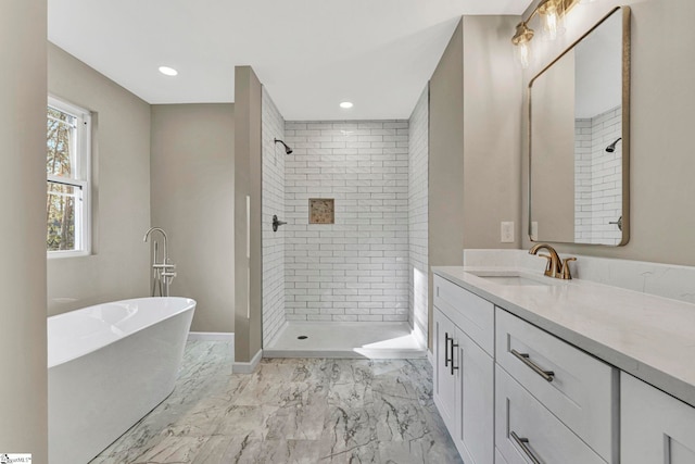 bathroom featuring plus walk in shower and vanity