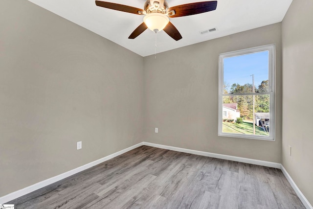 unfurnished room featuring ceiling fan and light hardwood / wood-style flooring