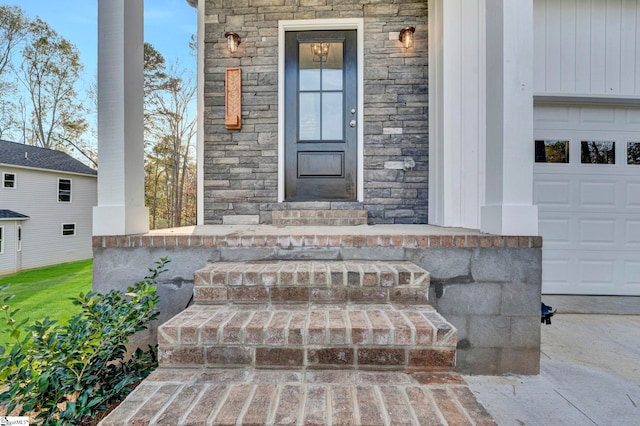 property entrance with a garage