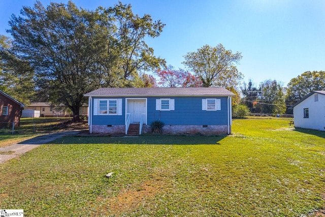 view of front of home with a front yard