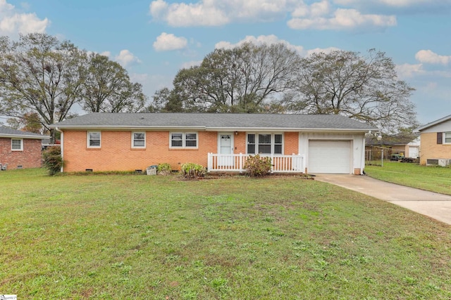 ranch-style home with a porch, a garage, and a front lawn