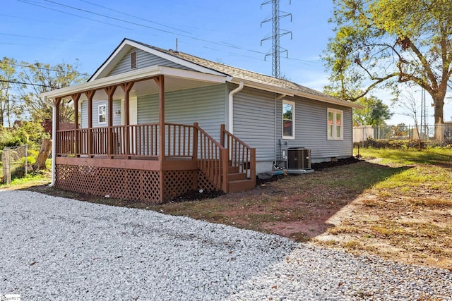 exterior space featuring central AC unit and a porch