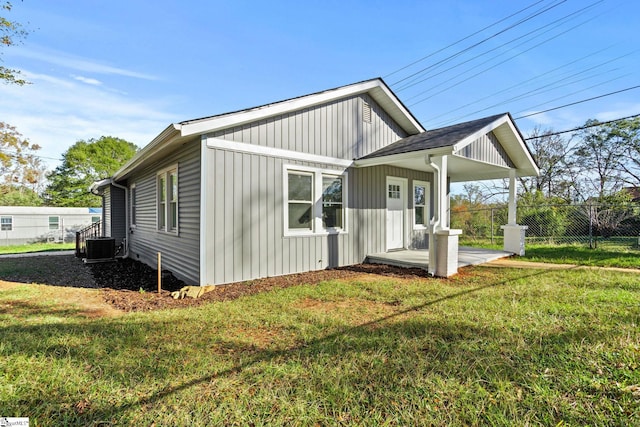 exterior space with a lawn and a porch