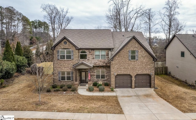 view of front of home with a garage