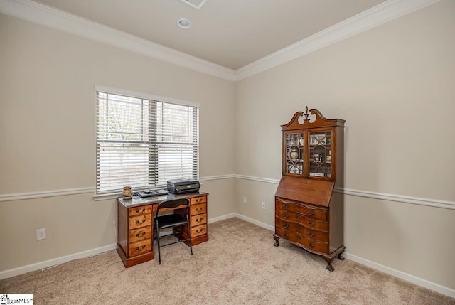 carpeted home office featuring ornamental molding