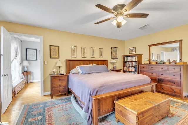 bedroom featuring ceiling fan and light wood-type flooring