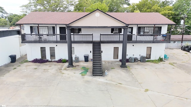 view of front facade featuring cooling unit