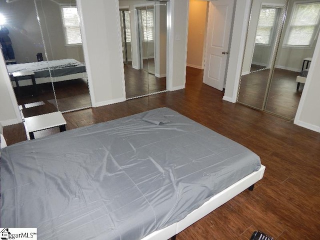 bedroom featuring dark hardwood / wood-style floors