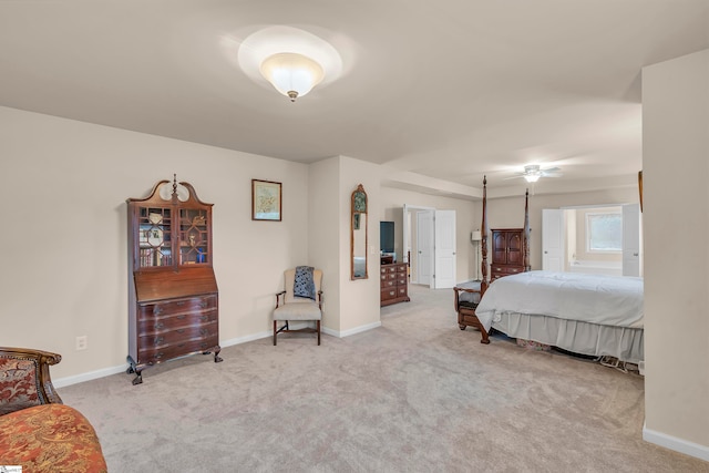 bedroom featuring light carpet